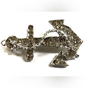 Vintage retro pinup silver tone rhinestone anchor brooch pin.